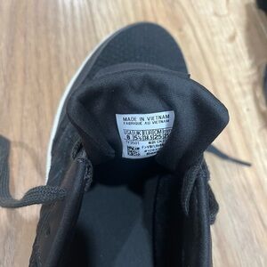 Black Reebok sneakers